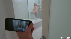 This blonde whore films herself in the shower