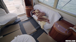 Exotic young brunette has lots of fun on the yacht